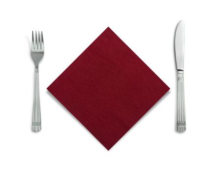 Fork and knife in a red cloth isolated on white background