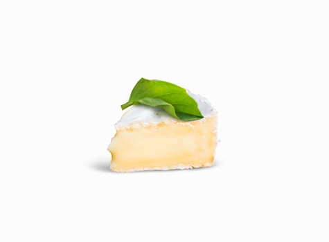 Fresh Piece smelly camembert cheese on a white background