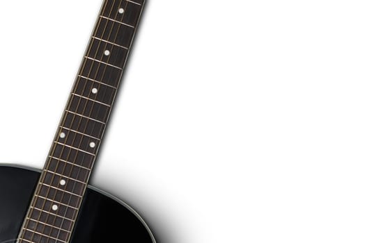 Black acoustic guitar on a white background