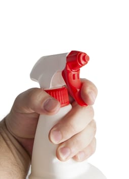 Hand holding white plastic spray bottle. Isolated on a white background. With clipping path.