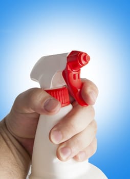 Hand holding white plastic spray bottle. With clipping path.