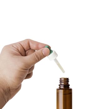 Hand man scientist, doctor keeps the pipette for drop over the container with liquid, medication or chemical substance laboratory. Isolated on white background with clipping path