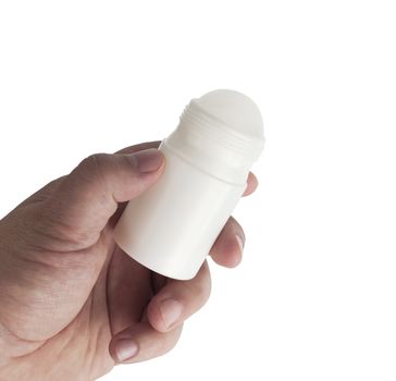 Roll-on deodorant in the male hand. With clipping path.