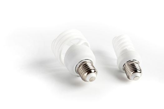 Energy saving light bulb on a white background isolated.