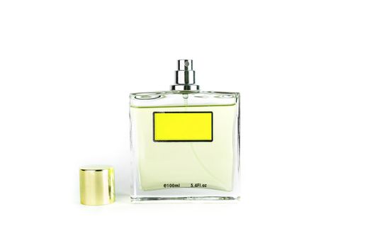 Perfume in beautiful yelow color bottle isolated on white background