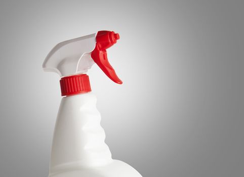 Plastic bottle with sprayer for liquids isolated on white background. With clipping path