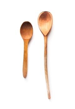 Two wooden spoons isolated on white background