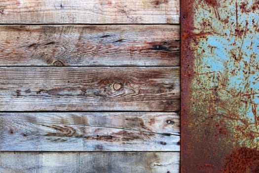 Wooden Wall with a Old Blank Metal Rusty Placard