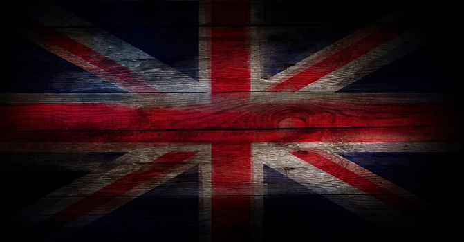 Grunge UK flag on a wood surface