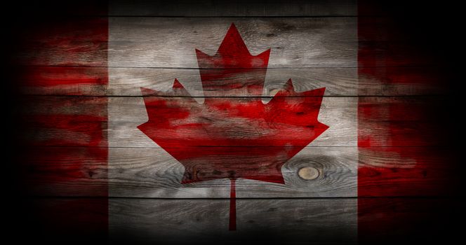 Grung Flag of Canada painted on grungy wood plank