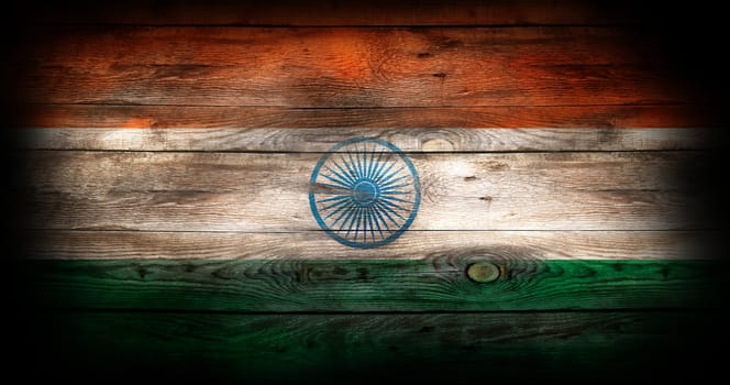Flag of India painted on grungy wood plank