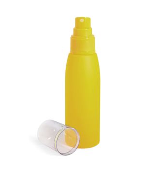 Yellow cosmetic cream bottle, spray opened isolated on white background