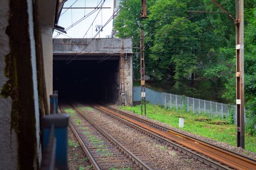 Railway lines and tunnel in Warsaw Poland on a cold overcast day.