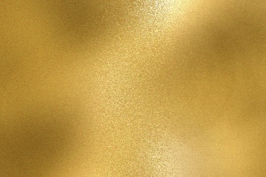 Abstract background, shiny yellow metal foil texture