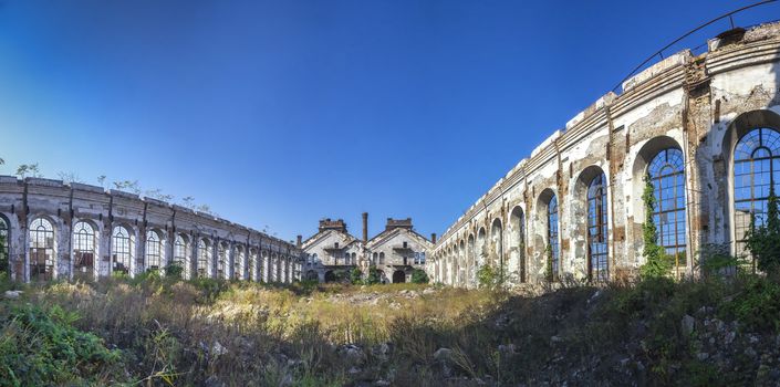 Old abandoned industrial factory Krayan in Odessa, Ukraine, in a sunny summer day