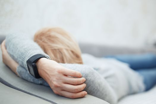 Woman sleeping with smart watch