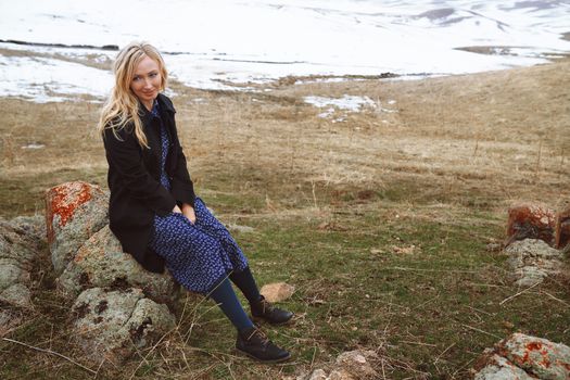 Smiling woman in the winter landscape