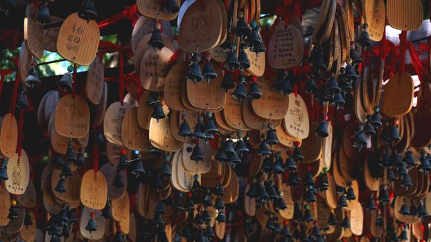 eople write and hang Ema Wood tag or Wooden label for praying for good luck happy other at Sanya, China