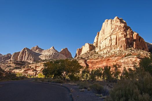 A roadside view over the Navajo Dome and other sandstone formations in the Capitol Reef National Park