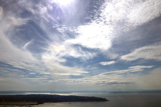 Blue sky with clouds over the ocean. Wallpapers, seascape, background