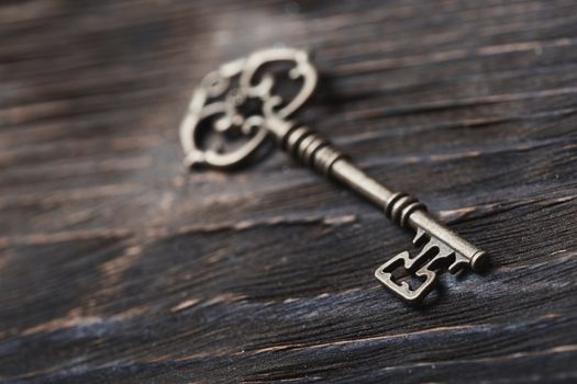 Vintage skeleton key on a table. Close-up