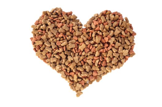 Dried cat food biscuits in a heart shape, isolated on a white background