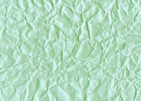 Green texture background of crumpled paper