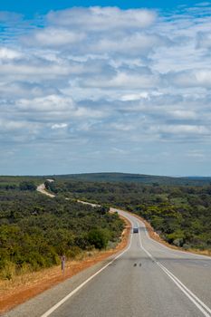 Outback road in Western Australia winding along the coast though the bush of Western Australia