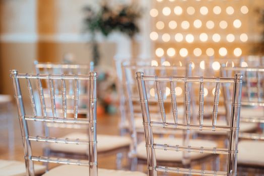 wedding ceremony area, arch chairs decor