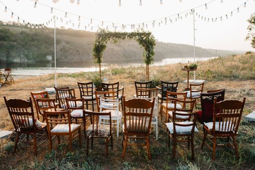 wedding ceremony area, arch chairs decor