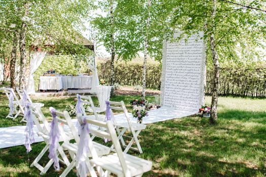 wedding ceremony area, arch chairs decor