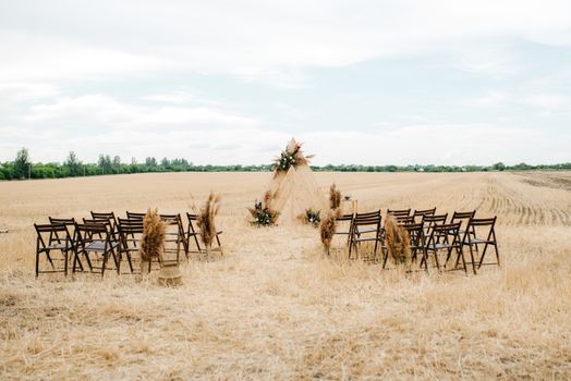 wedding ceremony area, arch chairs decor