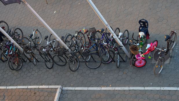 Above view on a bunch of parked bicycles