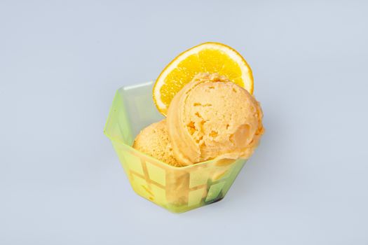 Icecream with different ingredients on a studio neutral background