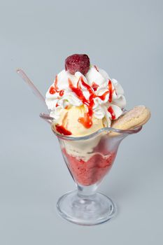 Icecream with different ingredients on a studio neutral background