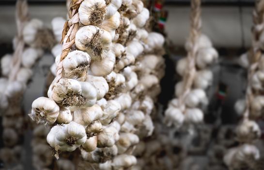 italian market garlic string hang background .