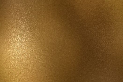 Shiny rough bronze metal wall, abstract texture background
