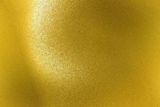 Shiny rough gold metal wall, abstract texture background