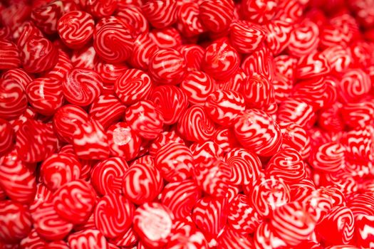 A macro shot of red sweet candy.