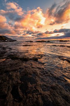 This is a color landscape photo of the Pacific Ocean at a rocky beach in Oregon.