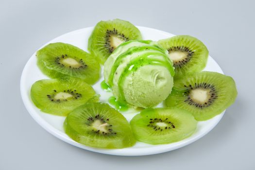 Icecream with different ingredients on a studio neutral background