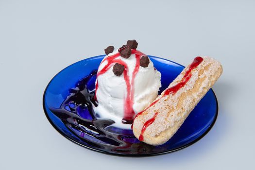 Icecream with different ingredients on a studio neutral background
