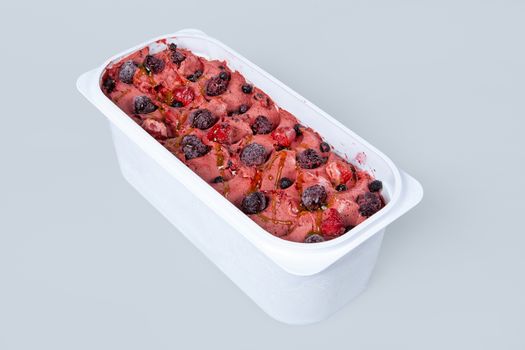 Icecream with different ingredients on a studio neutral background