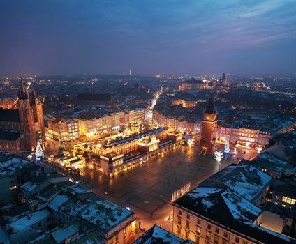 Aerial view of the Market Square in Krakow, Poland at night. Christmas cityscape