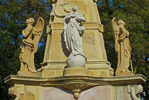 Statuettes on monument in Subotica square, Serbia