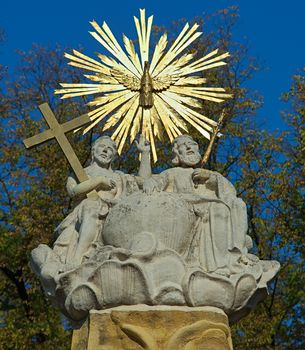 Statuettes on top of monument in Subotica square, Serbia