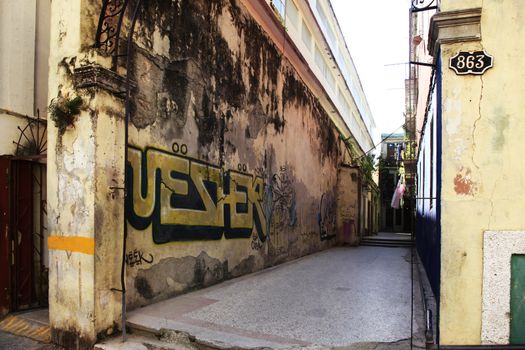Graffiti on the wall of a building on street San Martin in Havana, Cuba