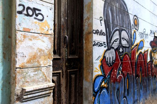 Graffiti on the wall of a building in Havana