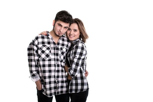 Happy young couple embracing each other isolated on white background