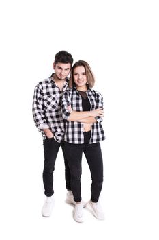 Full lenght happy young couple portrait isolated on white background